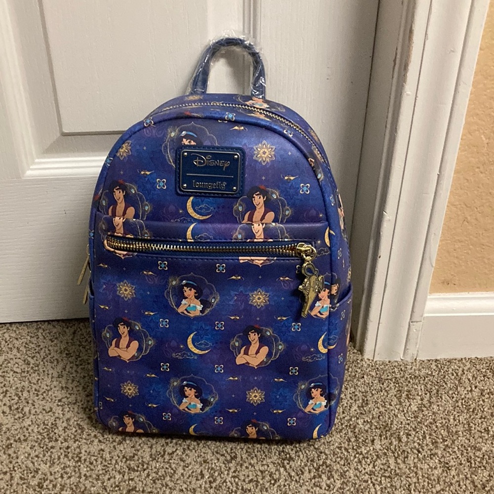Loungefly 707 Aladdin + Jasmine mini Backpack NWT. Inside & out zipper pockets